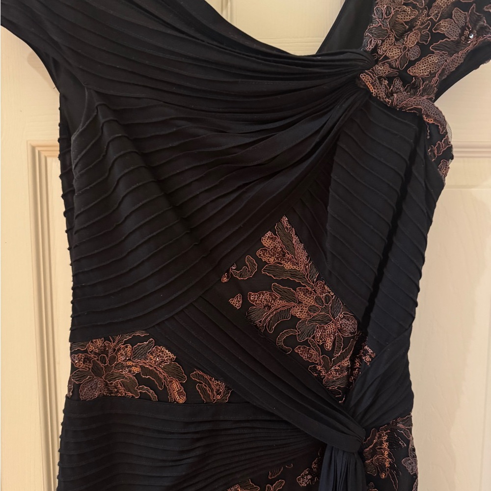 Tadashi Shoji Black and Rust Formal Gown with Black Asymmetrical Pleating.